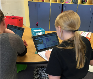 Students Coding in Scratch