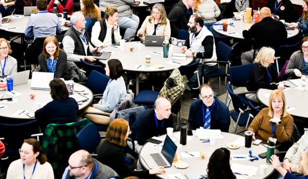 Teachers engaging in discussion at an EdTechTeacher event.